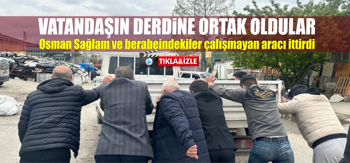AK Parti Karaman Milletvekili adayı Osman Sağlam çalışmayan aracı ittirdi